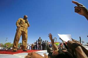 Bashir was known for his populist touch and addressed crowds in colloquial Sudanese Arabic. By ASHRAF SHAZLY (AFP/File)