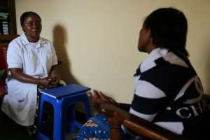 Both Tania, right, and her daughter Sofia (not their real names) fell pregnant after they were gang-raped. Tania is shown here speaking to a psychologist. By SAMIR TOUNSI (AFP)