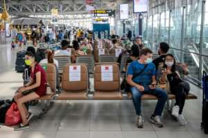 Blocked out seats ensure travellers observe social distancing rules at Suvarnabhumi Airport in Bangkok. By Jack TAYLOR (AFP)