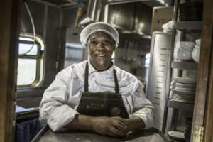 Blue Train staff like head chef Esther Ndhlovu put together menus of three to five courses along with wine pairings for the passengers. By MARCO LONGARI (AFP)