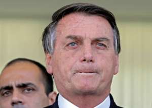 Brazilian President Jair Bolsonaro pictured during a statement on financial aid for vulnerable Brazilians on Tuesday.  By Sergio Lima (AFP)