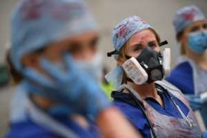 British nurses demonstrated in London for higher pay on Saturday. By JUSTIN TALLIS (AFP/File)