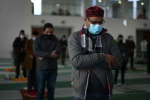 British imams hope they can dispel vaccine fears among the Muslim faithful. By DANIEL LEAL-OLIVAS (AFP)