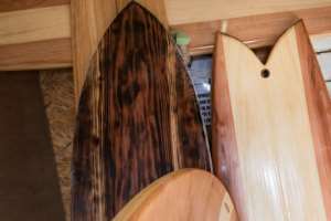 Burnett has sold his hand-crafted boards to surfers around the world -- they sell for up to $1,700 apiece. By RODGER BOSCH (AFP)