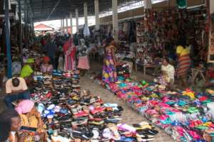 Bustling markets remain open. By Tchandrou Nitanga class=