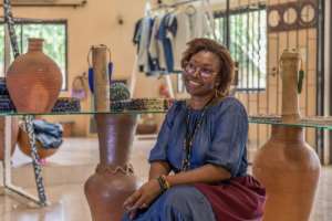 Business manager Nadia Adanle says working with people living with a disability does not affect productivity at the company at all. By Yanick Folly (AFP)