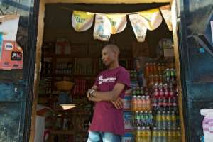 Businesses were closed the day after the coup, but many small business in the informal sector stayed open. By ANNIE RISEMBERG (AFP)