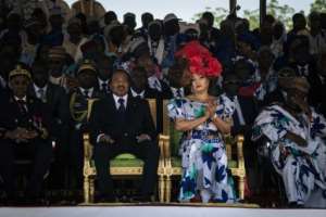 Cameroonian President Paul Biya, pictured here with his wife in 2018, has ruled for nearly four decades. By ALEXIS HUGUET (AFP)
