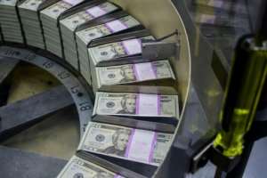 Central banks pumped huge amounts of money into the economy to avoid a meltdown. By Eva HAMBACH (AFP/File)