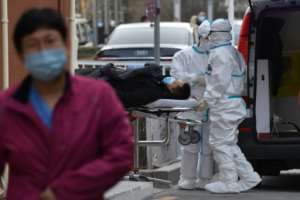 China, where the virus first emerged in late 2019, has largely eliminated its outbreak, but recent weeks have seen a smattering of cases. By GREG BAKER (AFP)