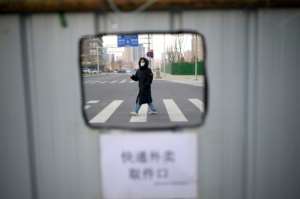 China has locked down millions as it battles its first significant outbreak in months. By Noel Celis (AFP)