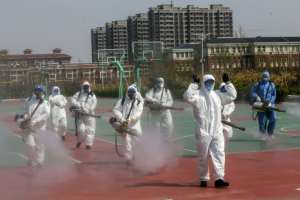 China reported a surge in new coronavirus infections Monday, most of them imported from abroad. By STR (AFP)