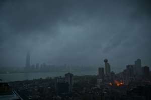 Chinese authorites are taking tentative steps to ease the lockdown of Wuhan, the city where the virus first struck late last year. By Hector RETAMAL (AFP)