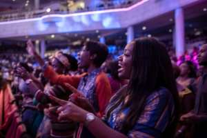 Christian services in Nigeria are often exuberant affairs, staged in venues that can hold thousands of people. By STEFAN HEUNIS (AFP)