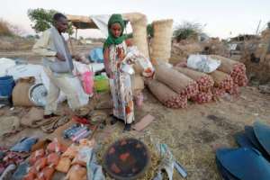 Christmas is a key religious festival for many Ethiopians, and refugees in Sudan on Wednesday bought up supplies to mark the holiday. By ASHRAF SHAZLY (AFP)