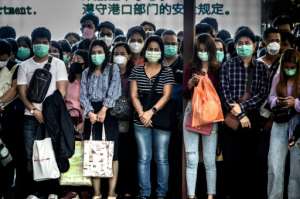 Commuters in Bangkok. Face masks are in short supply across many parts of Asia. By Mladen ANTONOV (AFP)