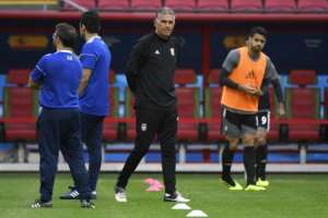 Coach Carlos Queiroz (C) concedes Iran now face one of the biggest challenges in their World Cup history, but maintains they can
