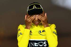 Colombia's Egan Bernal on the Tour de France podium last July in his Ineos yellow jersey. By Marco Bertorello (AFP/File)