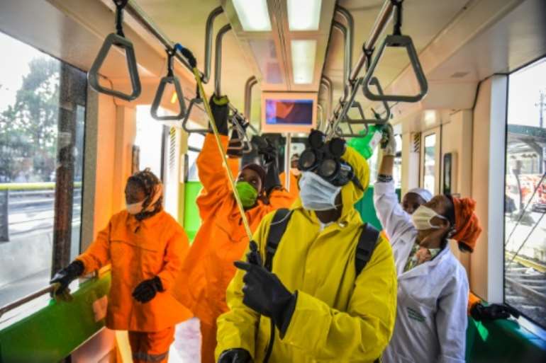 Cleaning staff disinfect a metro carriage in Addis Ababa- Ethiopia announced its first COVID-19 deaths Sunday. By Michael Tewelde