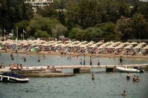 Crowded beaches near Athens, after they were allowed to open on Saturday, when temperatures hit 38C. By Angelos Tzortzinis (AFP)