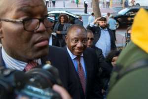 Cyril Ramaphosa (C), South Africa's deputy president and newly elected president of the ruling African National Congress (ANC), says he will tackle corruption in the country