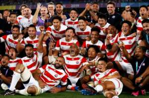 Day to remember: Japan's players celebrate beating Scotland. By Odd ANDERSEN (AFP/File)