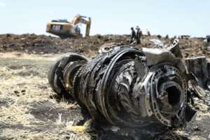 Debris of a Boeing 737 MAX 8 plane strewn over a crash site outside Addis Ababa. By Michael TEWELDE (AFP)