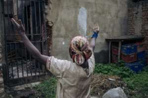 Desolation: Fabiola Mbambu Kambere survived an attack on the village Nzenga but her home was destroyed. By ALEXIS HUGUET (AFP/File)