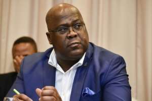 DR Congo President Felix Tshisekedi's party is in talks with supporters of ex-leader Joseph Kabila about the makeup of a new government.  By JOHN THYS (AFP/File)
