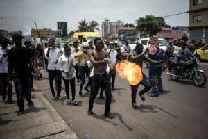 DRC's growing army of rappers say their urban lyrics reflect a gritty realism edged with angst as one of Africa's biggest and most unstable nations heads towards a troubled presidential election .  By JOHN WESSELS (AFP)