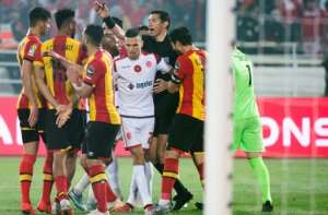 Egyptian referee Gehad Grisha tries to restore order during the first leg. By FADEL SENNA (AFP/File)