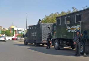Egyptian riot police stood guard in Cairo amid an intensifying crackdown against dissent. By Khaled DESOUKI (AFP)