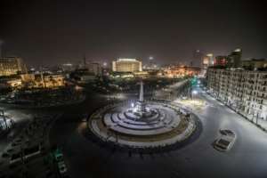 Egypt's landmark Tahrir Square in Cairo stands empty on the first evening of a two-week long night-time curfew imposed by the authorities. By Khaled DESOUKI (AFP)