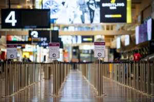 Empty check-in counters are seen at the international terminal of Arlanda airport in Sweden. By Jonathan NACKSTRAND (AFP)