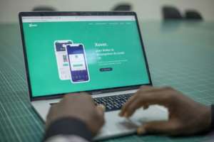 Entrepreneurs at Seme-One have developed X-over, a mobile phone app that makes it possible to trace the chain of contacts made by a person infected with coronavirus. By Yanick Folly (AFP)