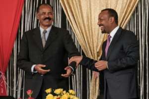 Eritrean President Isaias Afwerki (left) and Ethiopian Prime Minister Abiy Ahmed have made efforts to improve relations between former rival nations. By EDUARDO SOTERAS (AFP / File)