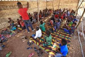Ethiopian refugee children who fled the Tigray conflict attend classes held by the Norwegian Refugee Council in the Um Raquba camp. By ASHRAF SHAZLY (AFP)