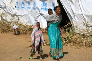 Ethiopian refugees have crossed over the border into Sudan. By ASHRAF SHAZLY (AFP)
