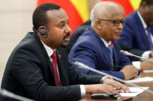 Ethiopia's Prime Minister Abiy Ahmed has upped his tone, saying no force could stop his country building the dam. By Sergei CHIRIKOV (POOL/AFP)
