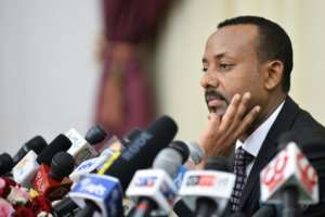 Ethiopia's Prime Minister Abiy Ahmed (pictured August 2018), who took office in 2015 and has dealt with many anti-government protests for his agressive reform agenda, has been almost unanimously re-elected.  By Michael Tewelde (AFP/File)