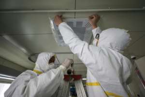 Experts say better ventilation and air filters in buildings may be needed to ward off coronavirus infection via airborne droplets. By STR (AFP/File)