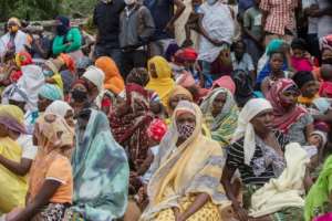 Families in Pemba, hoping to evacuate by boat to Palma in April. By Alfredo Zuniga (AFP)