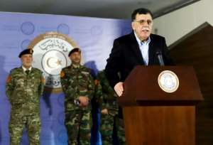Fayez al-Sarraj, Prime Minister of Libya's UN-recognised Government of National Accord), holds a press conference in the capital Tripoli on Monday. By - (AFP)