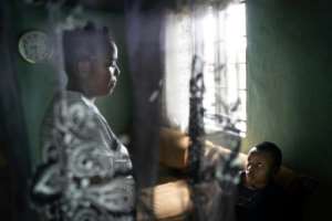 Fear: Regine Murengerantwari and her daughter. By Simon Wohlfahrt (AFP)