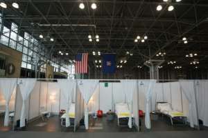 Field hospitals are sprouting in convention centres, sports arenas and parking lots all over the US as states gird for an expected influx of patients. By Bryan R. Smith (AFP/File)