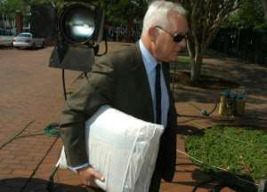 File picture from September 2006: Pierre Moynot arriving with documents at the Supreme Court where Zuma and French arms supplier Thint were on trial for corruption