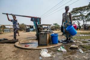 For the majority, public boreholes are the only option. By Jekesai NJIKIZANA (AFP/File)