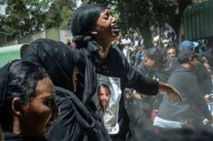 For those in mourning, it was even harder not to have any physical remains to bury, with the government saying it could take six months to identify the victims. By Samuel HABTAB (AFP)