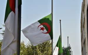Flags of Algeria fly at half-mast in mourning for the victims of the Kabylie region forest fires in Algeria's capital Algiers, on August 12, 2021. By Ryad KRAMDI (AFP)