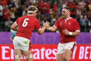 Flanker Aaron Wainwright (L) scored a try in the first half for Wales. By CHARLY TRIBALLEAU (AFP)